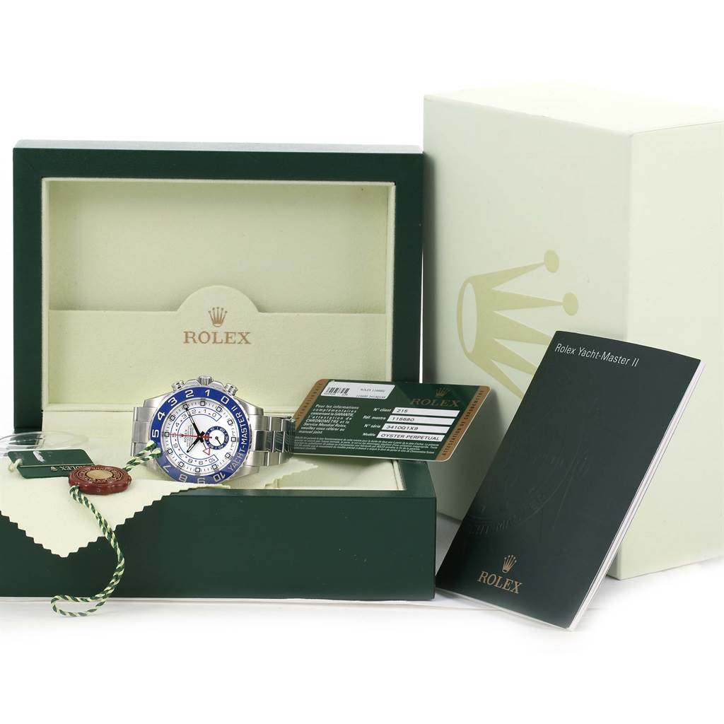 The image shows a Rolex Yacht-Master 116680 Men's Stainless Steel White Dial 116680 Men's Stainless Steel White Dial watch, its box, warranty card, hang tags, and manual from a front angle.