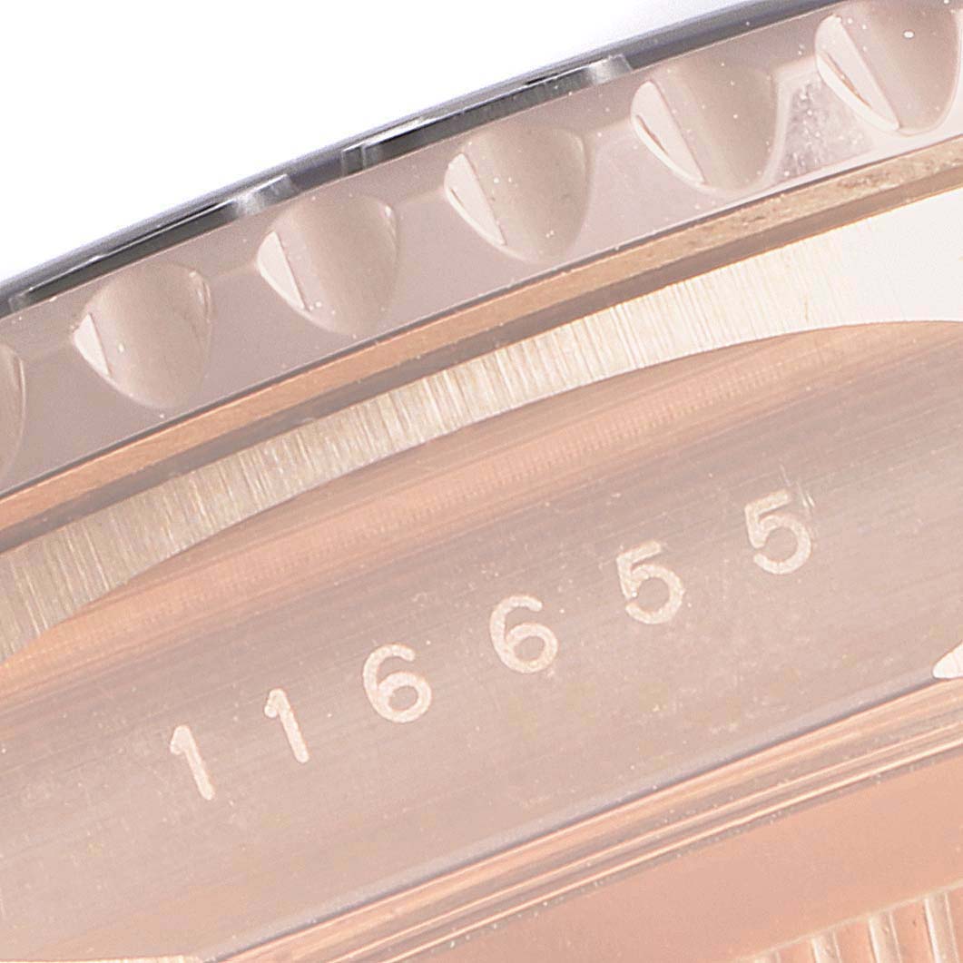 This close-up image of a Rolex Yacht-Master 116655 Men's Rose Gold Black Dial 116655 Men's Rose Gold Black Dial watch shows part of the bezel and the engraved model number 116655.