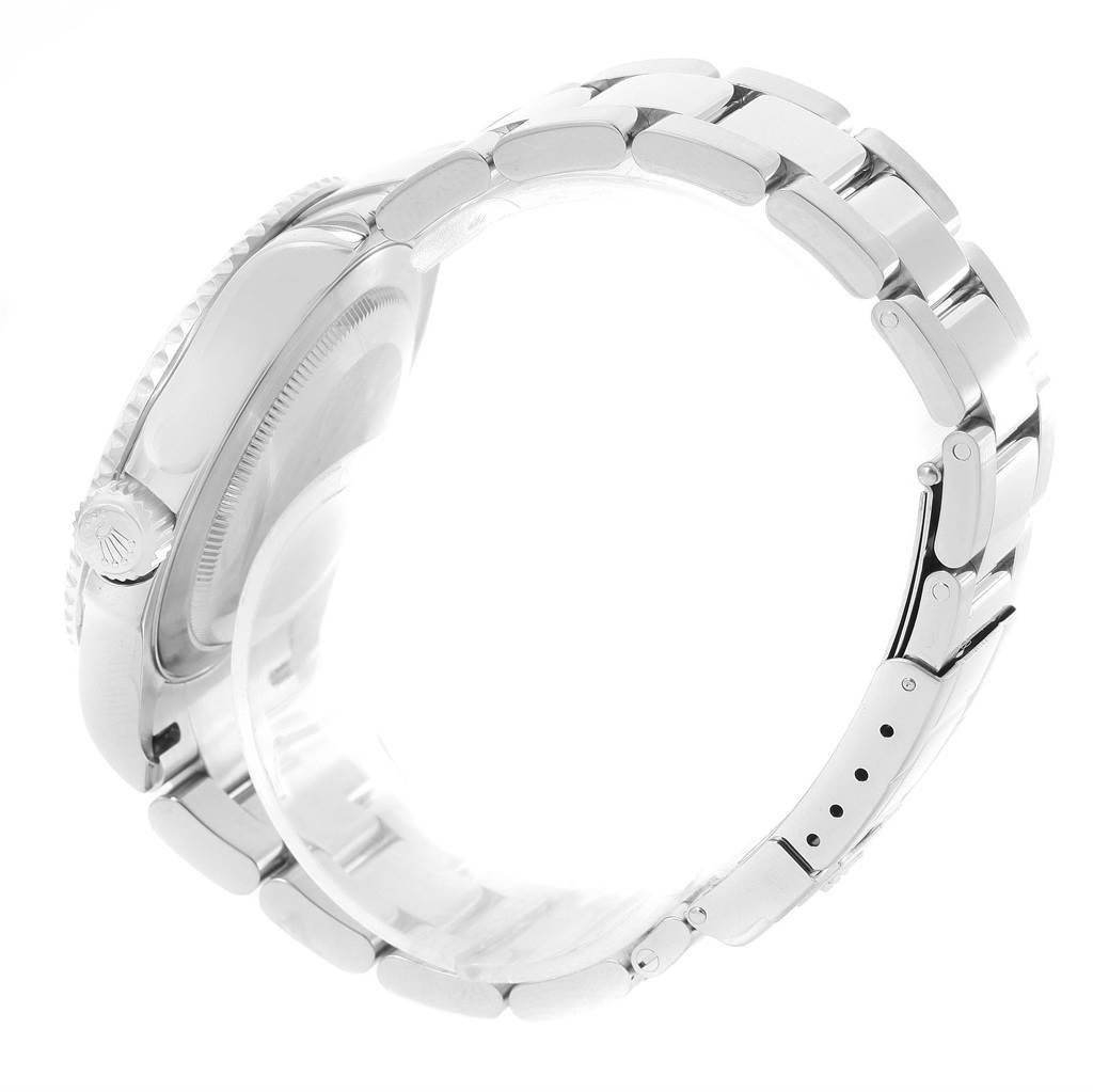 This image shows a side view of the Rolex Yacht-Master 16622 Men's Stainless Steel Silver Dial 16622 Men's Stainless Steel Silver Dial watch highlighting its bracelet and partially visible crown.