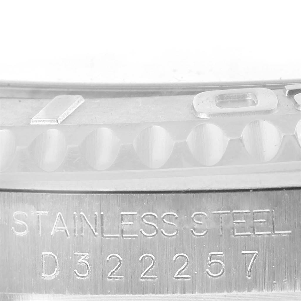 This image shows a close-up of the stainless steel casing and serial number of a Rolex Yacht-Master 16622 Men's Stainless Steel Silver Dial 16622 Men's Stainless Steel Silver Dial watch.