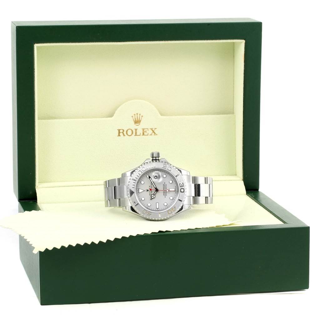 The Rolex Yacht-Master 16622 Men's Stainless Steel Silver Dial 16622 Men's Stainless Steel Silver Dial watch is shown in its open green and beige box, viewed from the front.