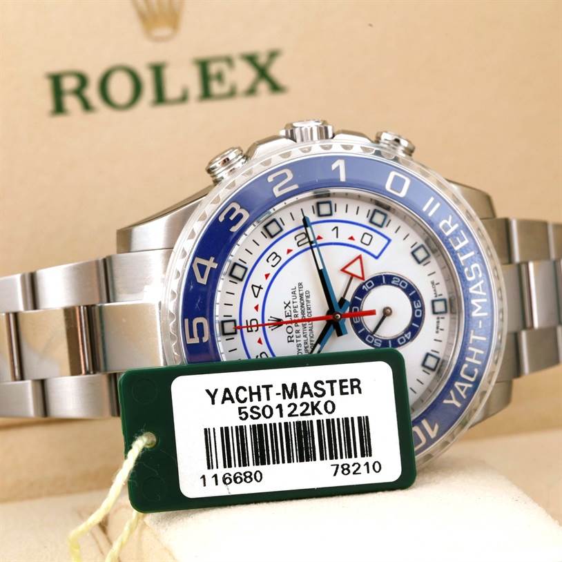 The image shows a close-up of a Rolex Yacht-Master 116680 Men's Stainless Steel White Dial 116680 Men's Stainless Steel White Dial watch, highlighting the dial, bezel, and part of the bracelet.