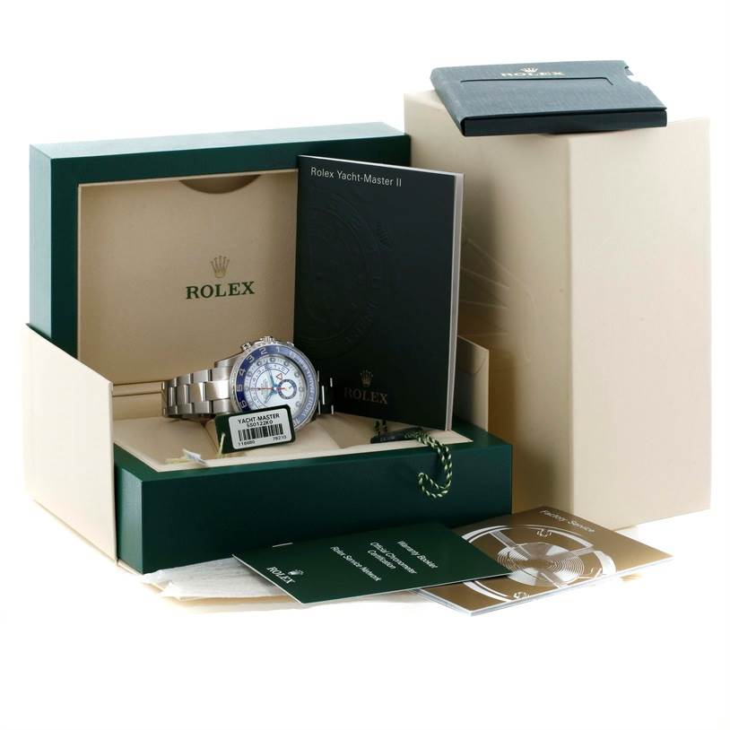 The Rolex Yacht-Master 116680 Men's Stainless Steel White Dial 116680 Men's Stainless Steel White Dial watch is displayed in its box with booklets and tags, viewed from the front.