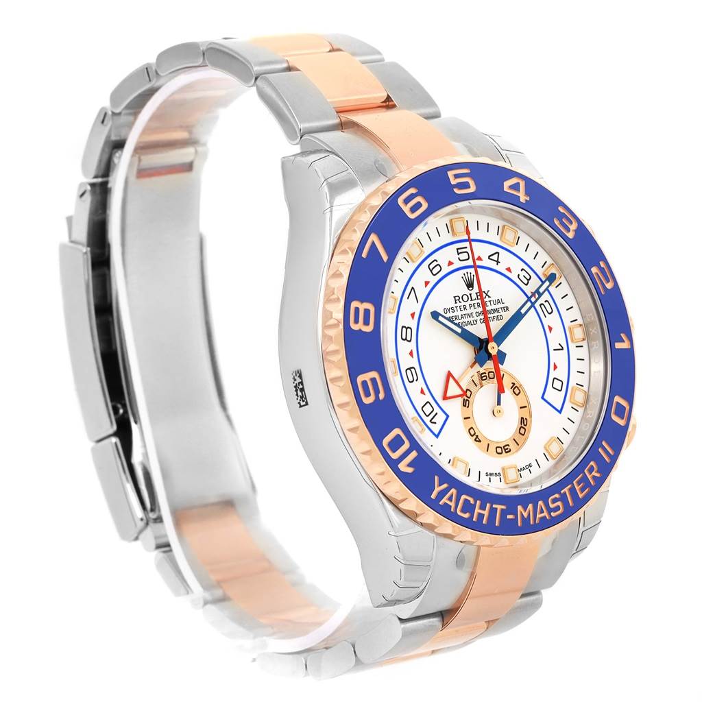The image shows a side angle of the Rolex Yacht-Master 116681 Men's Steel and Gold (two tone) White Dial 116681 Men's Steel and Gold (two tone) White Dial II, highlighting its bezel, dial, and two-tone bracelet.