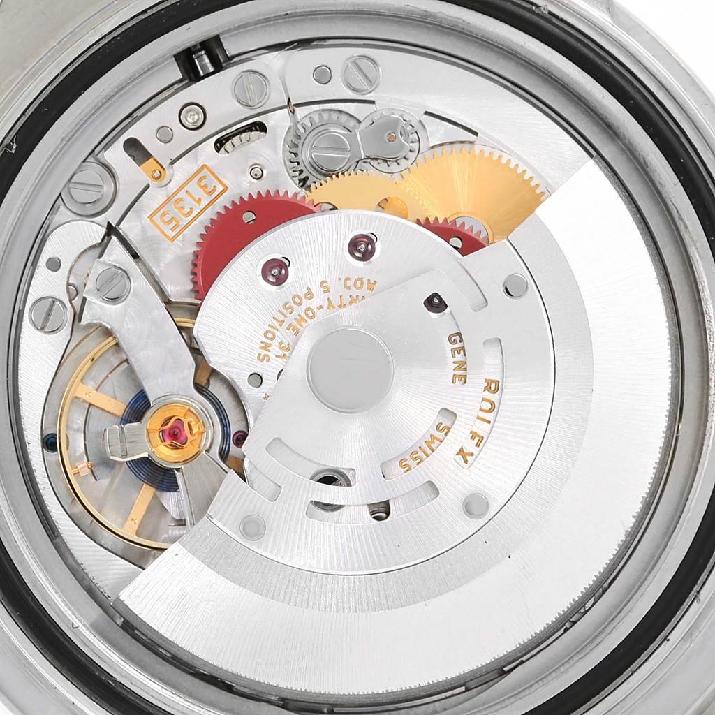 This Rolex Yacht-Master 116622 Men's Stainless Steel Blue Dial 116622 Men's Stainless Steel Blue Dial model shows an interior view of its intricate movement and gears.