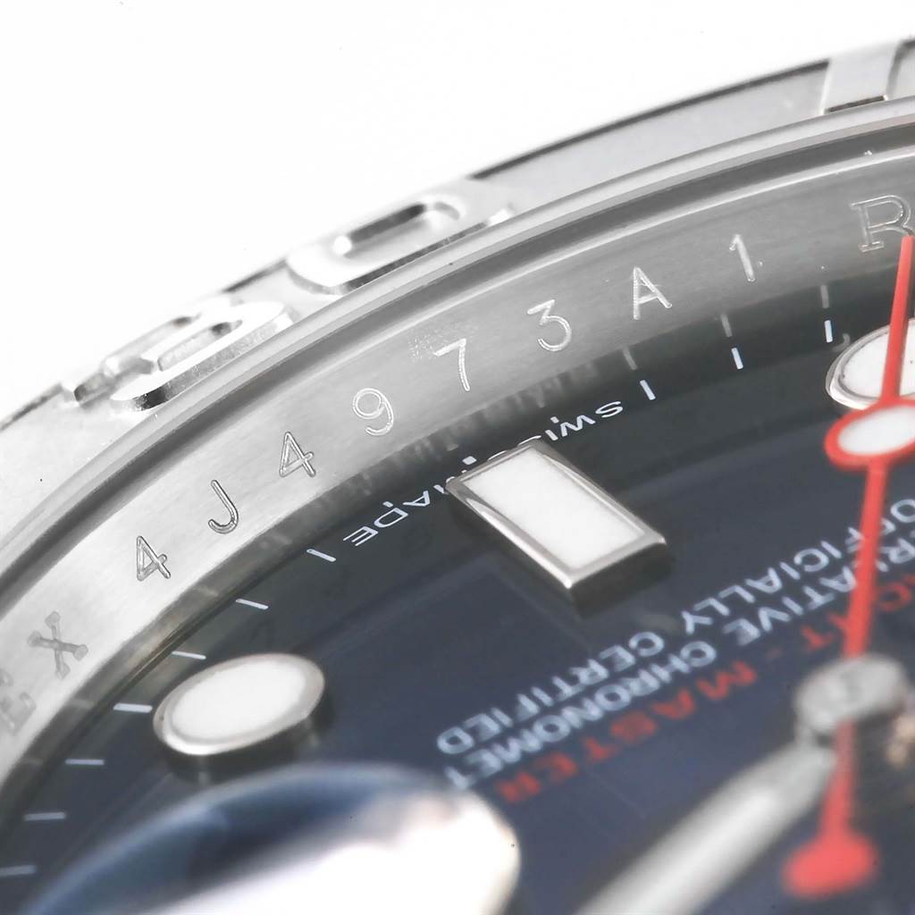 This close-up image of the Rolex Yacht-Master 116622 Men's Stainless Steel Blue Dial 116622 Men's Stainless Steel Blue Dial watch shows part of the bezel, dial, and serial number.