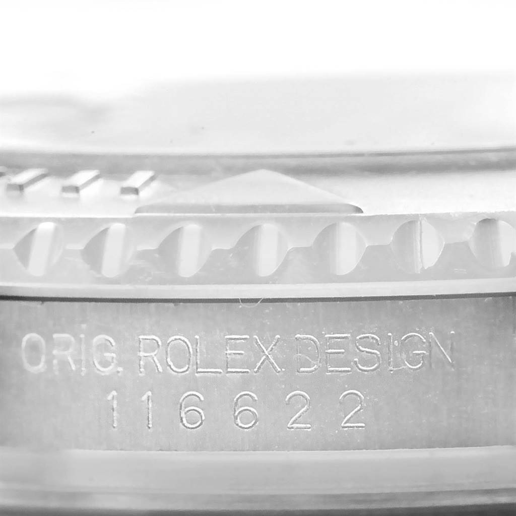 The image shows a close-up of the side of a Rolex Yacht-Master 116622 Men's Stainless Steel Blue Dial 116622 Men's Stainless Steel Blue Dial watch, displaying the bezel and engraving.
