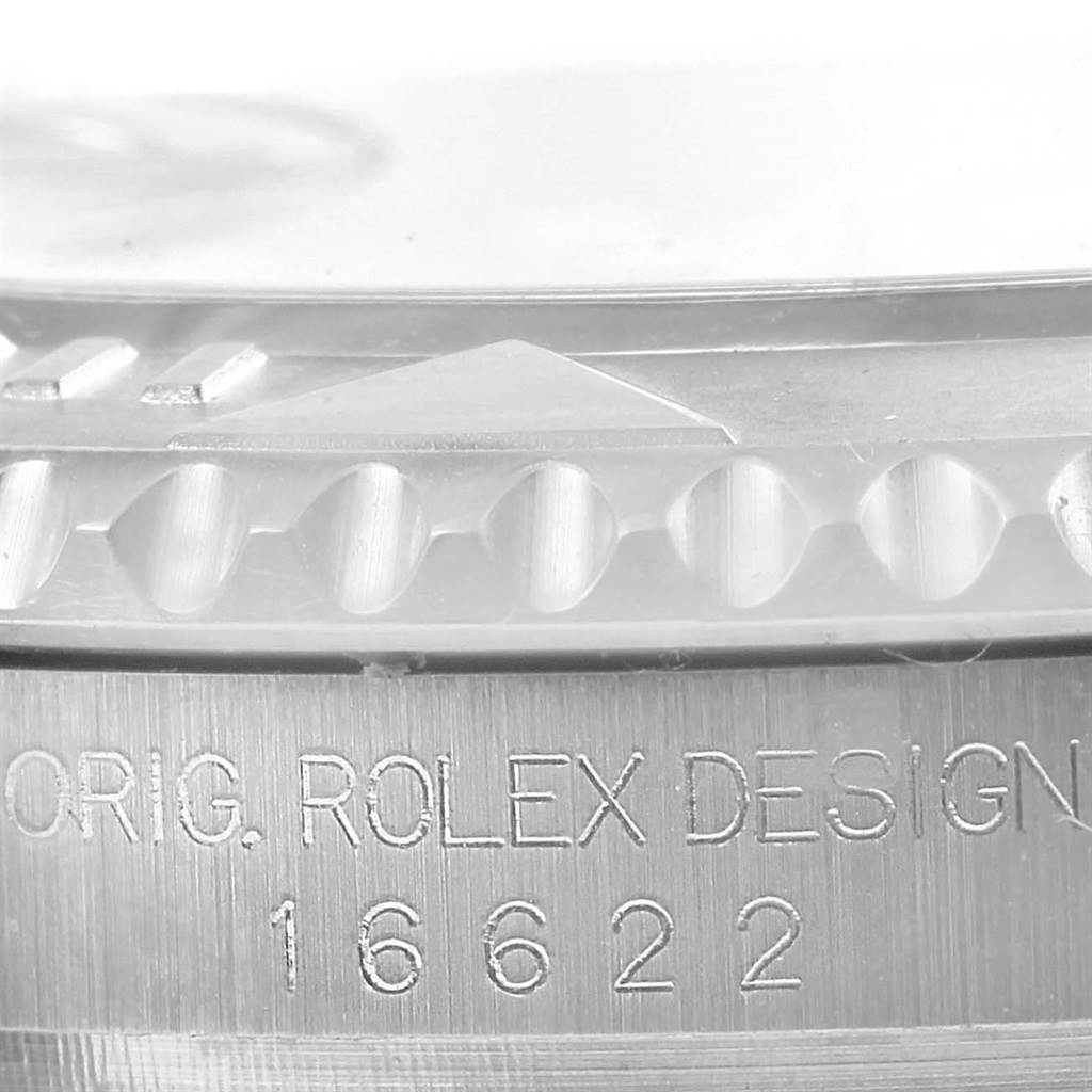 This image shows a close-up of the engraved serial number and bezel of the Rolex Yacht-Master 16622 Men's Stainless Steel Silver Dial 16622 Men's Stainless Steel Silver Dial watch.