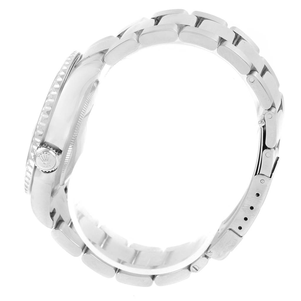 The image shows a side view of the Rolex Yacht-Master 16622 Men's Stainless Steel Silver Dial 16622 Men's Stainless Steel Silver Dial watch, highlighting the crown and metal bracelet with the clasp.