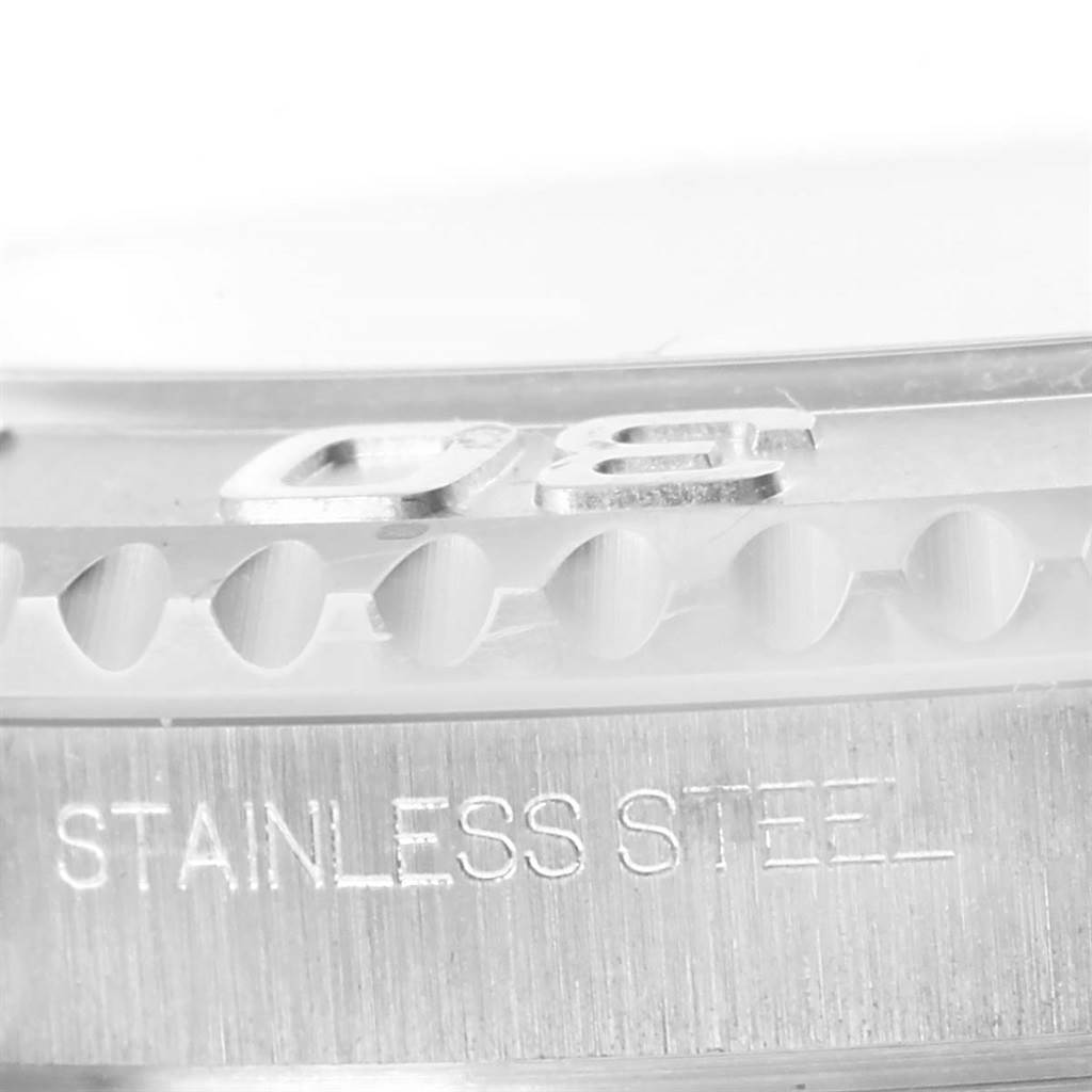 This image shows a close-up of the bezel and text indicating "STAINLESS STEEL" on a Rolex Yacht-Master 116622 Men's Stainless Steel Silver Dial 116622 Men's Stainless Steel Silver Dial watch.