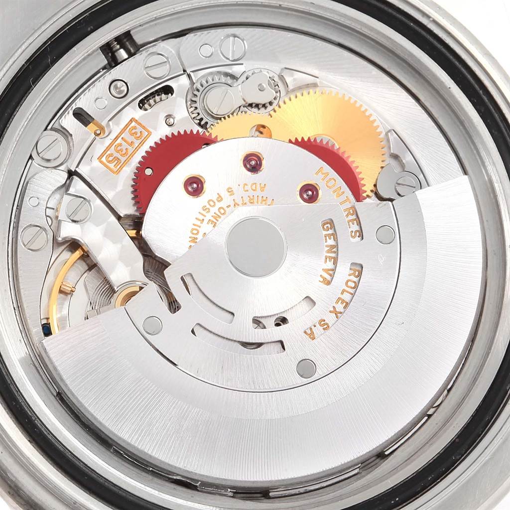 The image shows the intricate internal mechanism of a Rolex Yacht-Master 16622 Men's Stainless Steel Silver Dial 16622 Men's Stainless Steel Silver Dial watch, focusing on its movement components.