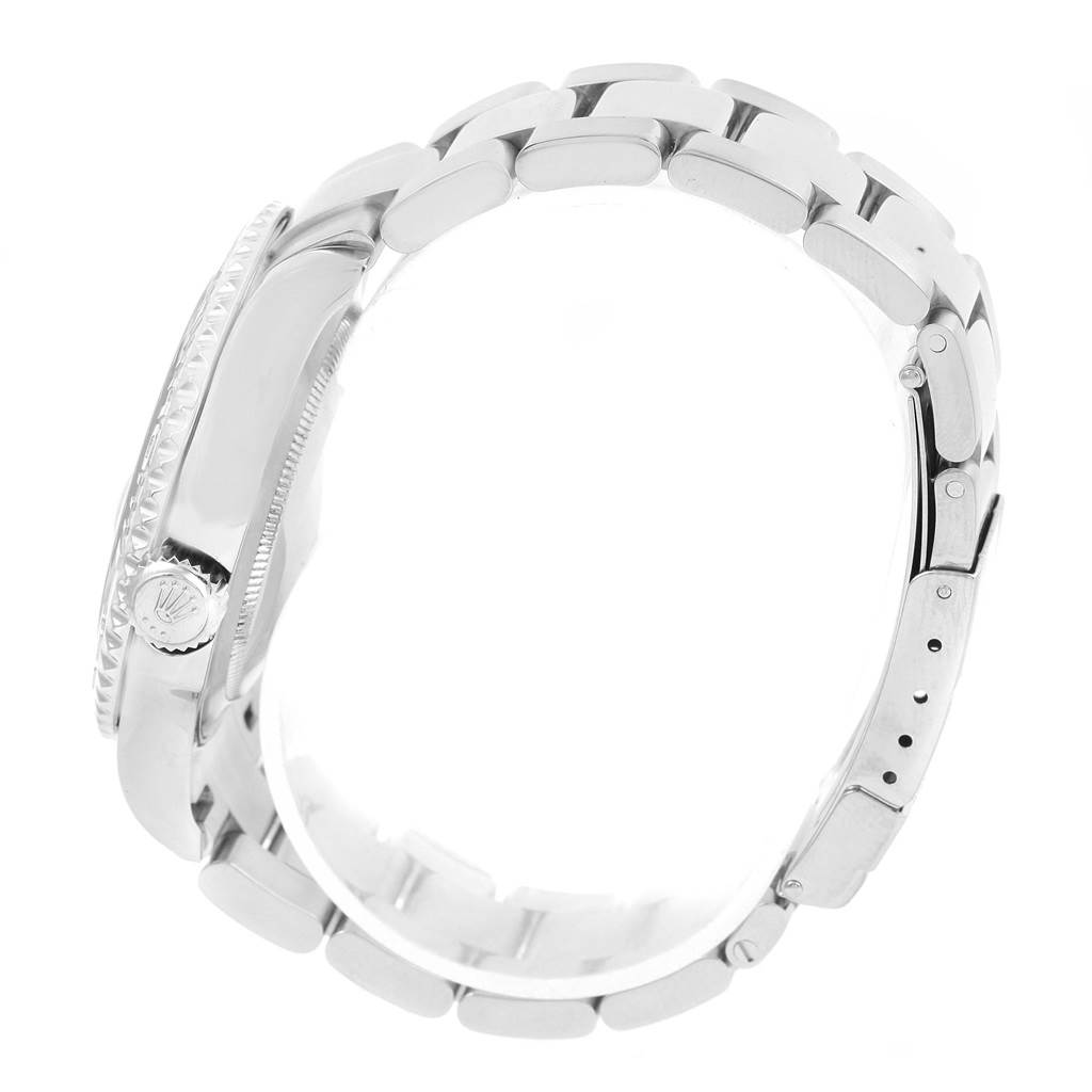 The image shows a side profile of the Yacht-Master model by Rolex, focusing on the crown and bracelet.