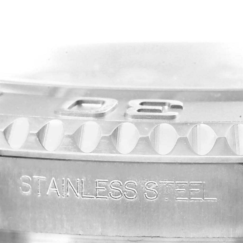Close-up side view of the Rolex Yacht-Master 116622 Men's Stainless Steel Silver Dial 116622 Men's Stainless Steel Silver Dial bezel showing the "Stainless Steel" engraving.