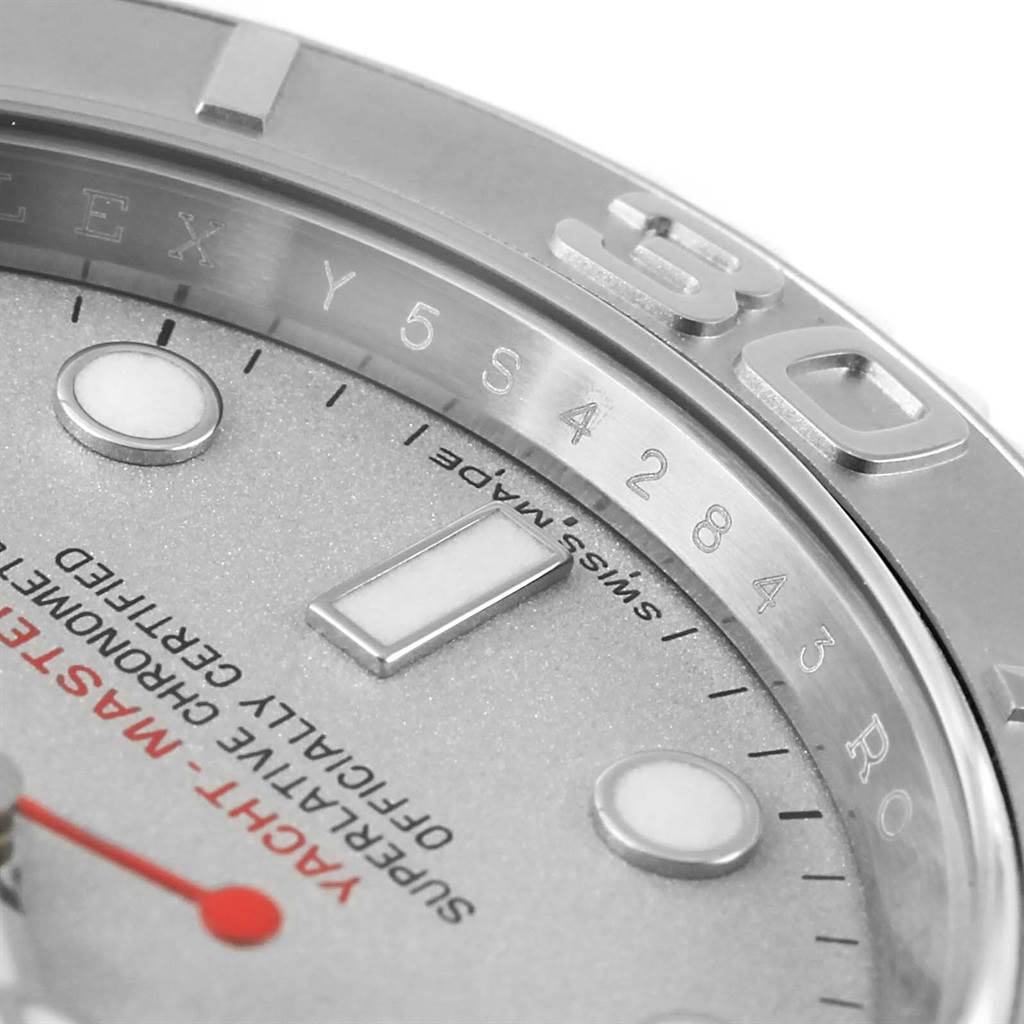 The image shows a close-up of the dial and bezel of the Rolex Yacht-Master 116622 Men's Stainless Steel Silver Dial 116622 Men's Stainless Steel Silver Dial watch, highlighting the numbers and text.