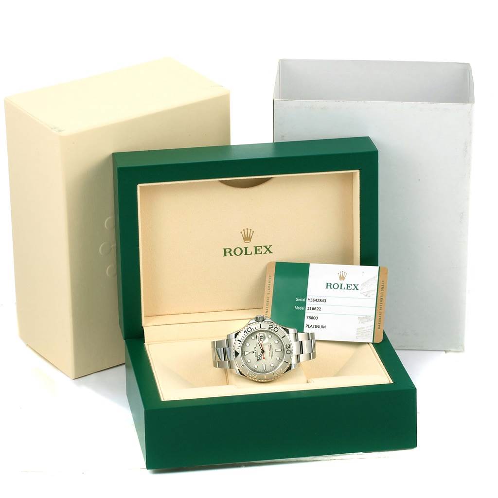 The image shows a Rolex Yacht-Master 116622 Men's Stainless Steel Silver Dial 116622 Men's Stainless Steel Silver Dial watch in an open display box with a certificate and outer packaging.