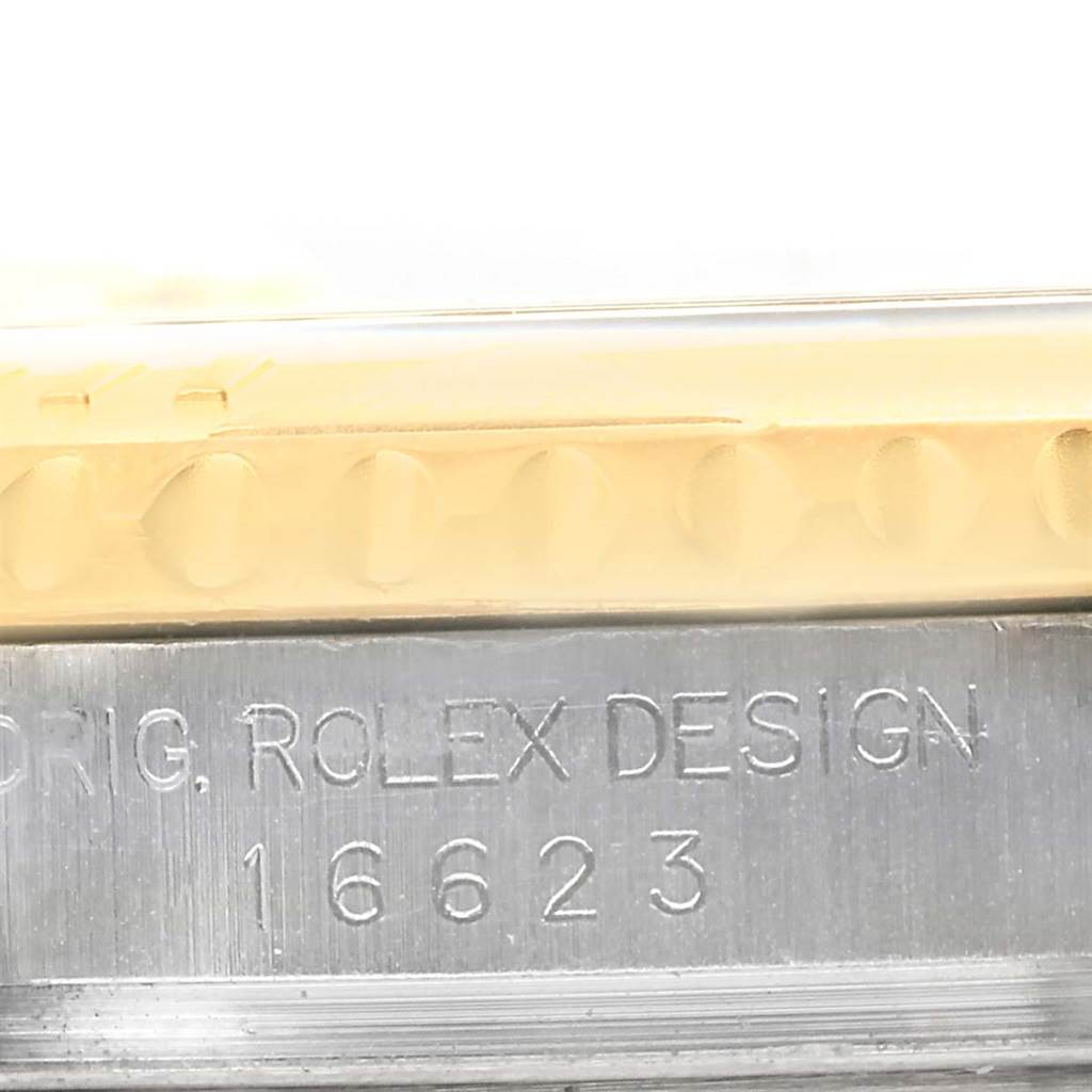 This close-up image shows the model number "16623" engraved on the side of the Rolex Yacht-Master 16623 Men's Stainless Steel Mother of Pearl Dial 16623 Men's Stainless Steel Mother of Pearl Dial watch case.