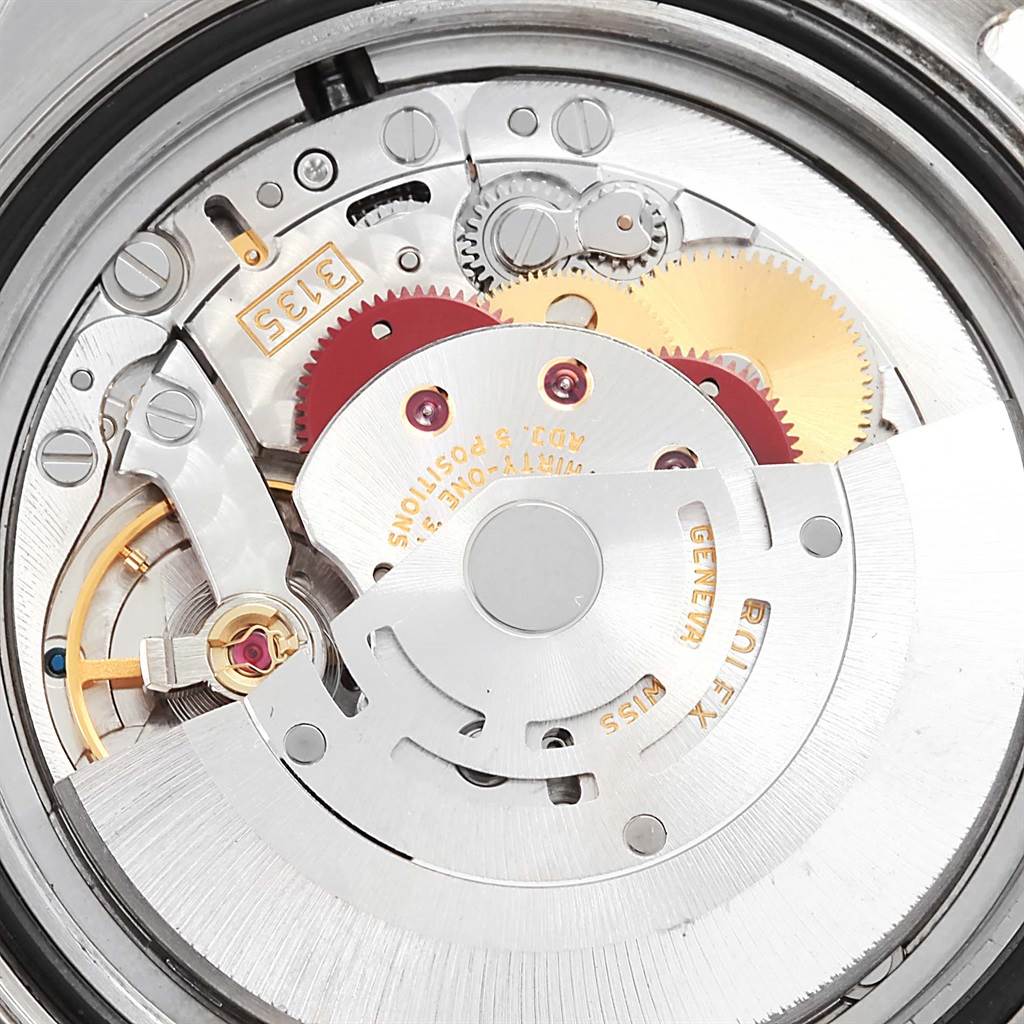 This image shows a close-up of the movement and components inside a Rolex Yacht-Master 16623 Men's Stainless Steel Mother of Pearl Dial 16623 Men's Stainless Steel Mother of Pearl Dial watch.