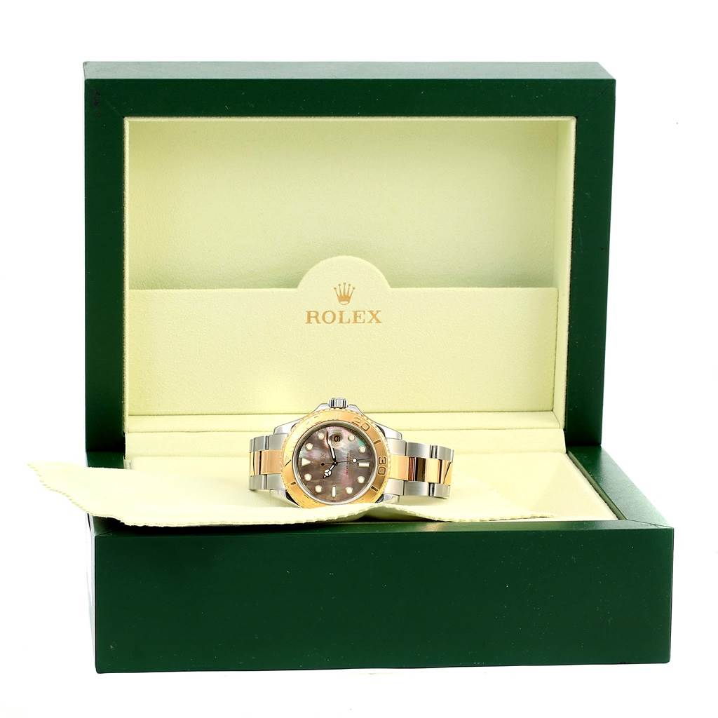 This image shows a Rolex Yacht-Master 16623 Men's Stainless Steel Mother of Pearl Dial 16623 Men's Stainless Steel Mother of Pearl Dial watch from the front, displayed in its open green and beige box.