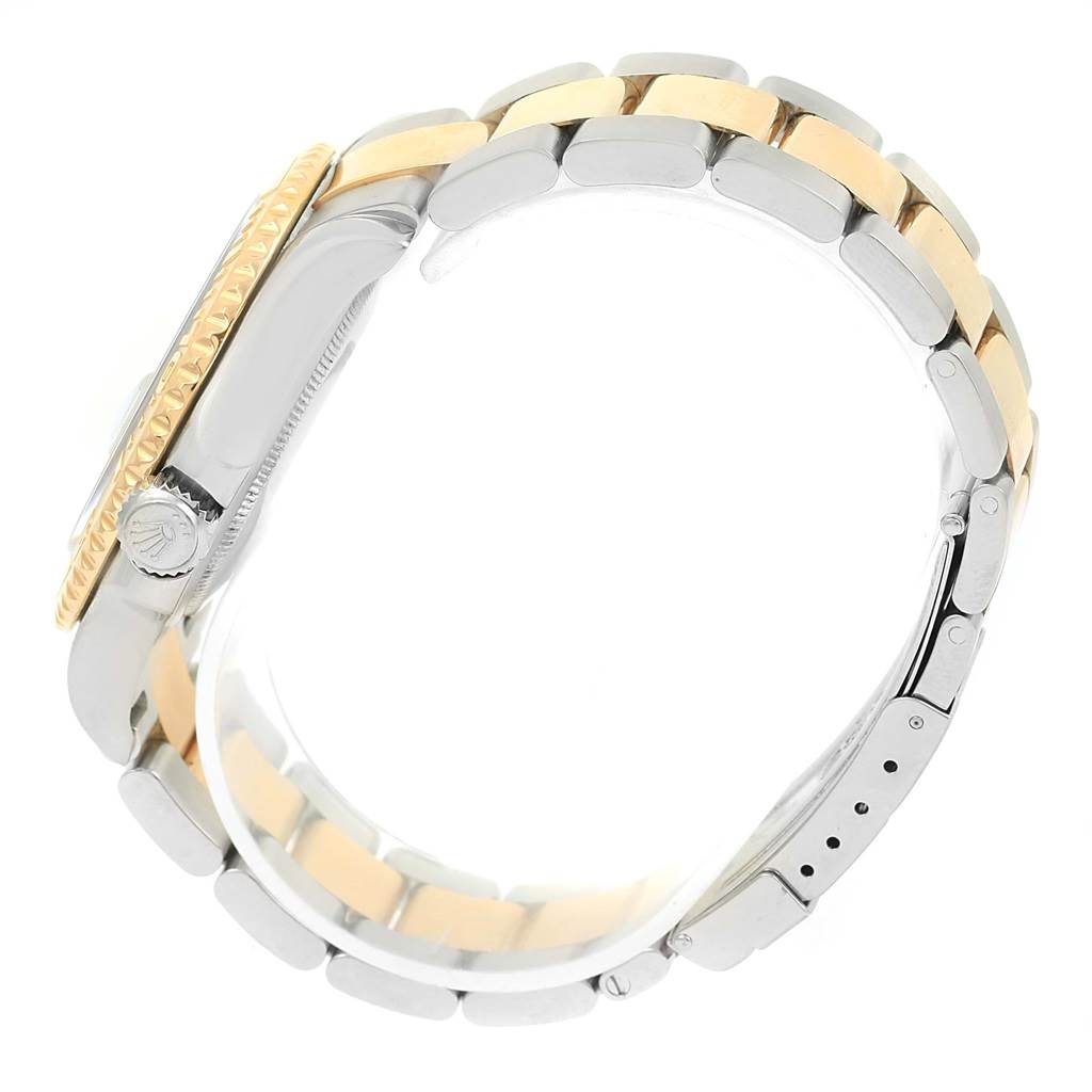 This image shows a side profile of a Rolex Yacht-Master 16623 Men's Stainless Steel Mother of Pearl Dial 16623 Men's Stainless Steel Mother of Pearl Dial watch, highlighting the crown, bezel, and metal bracelet.