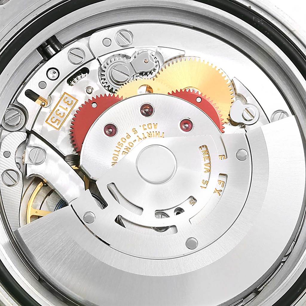 This close-up shows the internal movement mechanism of the Rolex Yacht-Master 116622 Men's Stainless Steel Blue Dial 116622 Men's Stainless Steel Blue Dial watch, highlighting gears and the rotor.