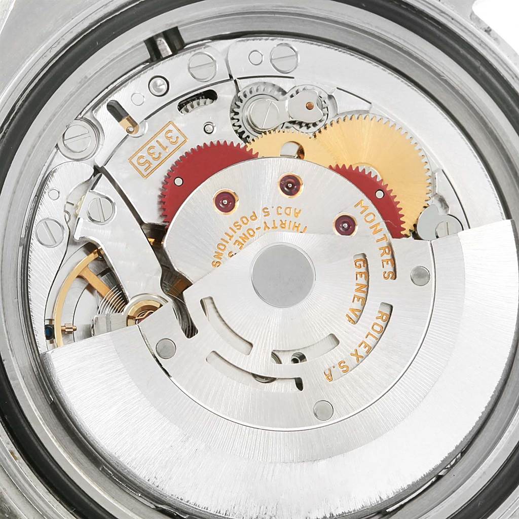 The image shows a close-up of the movement mechanism of a Rolex Yacht-Master 16622 Men
s Stainless Steel Silver Dial 16622 Men
s Stainless Steel Silver Dial watch.