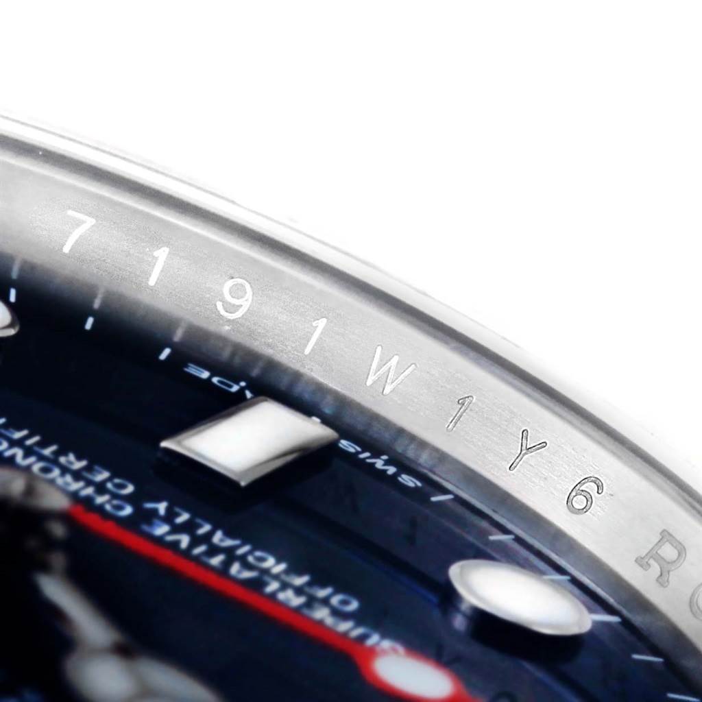 This close-up image shows the detailed dial and a portion of the bezel with engravings of the Rolex Yacht-Master 116622 Men's Stainless Steel Blue Dial 116622 Men's Stainless Steel Blue Dial watch.