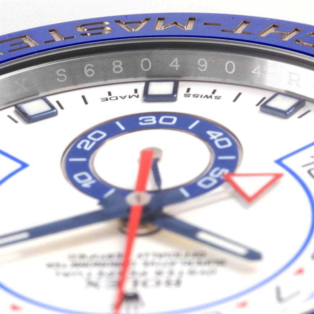 Close-up angle of the Rolex Yacht-Master 116680 Men's Stainless Steel White Dial 116680 Men's Stainless Steel White Dial watch displaying the bezel, part of the dial, and hands.