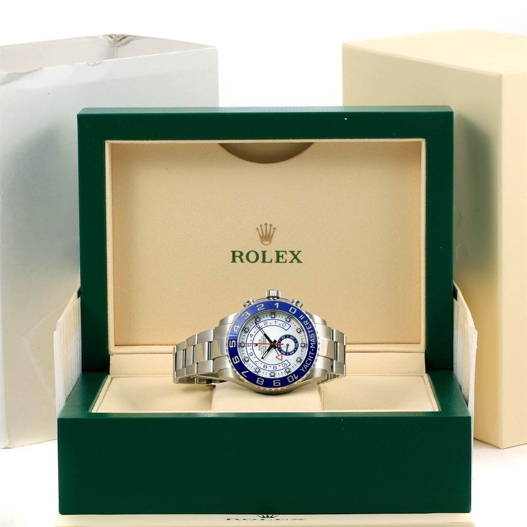 The Rolex Yacht-Master 116680 Men's Stainless Steel White Dial 116680 Men's Stainless Steel White Dial watch is displayed front-on inside an open green and beige branded box.