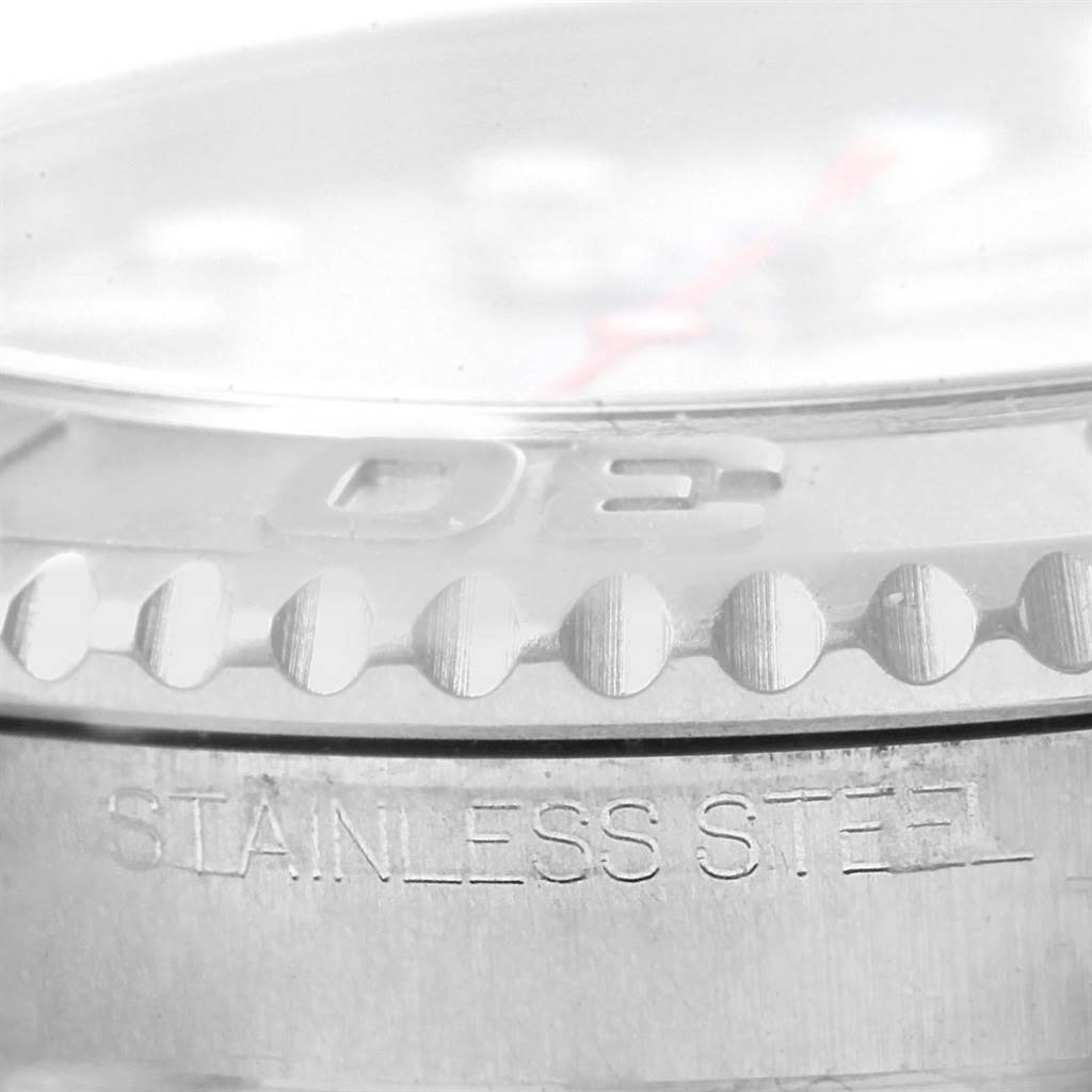 The image shows a close-up of the stainless steel bezel and case engraving of a Rolex Yacht-Master 168622 Stainless Steel Silver Dial 168622 Stainless Steel Silver Dial watch.