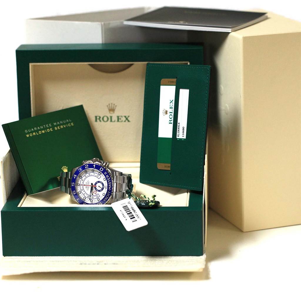 The image shows a Rolex Yacht-Master 116680 Men's Stainless Steel White Dial 116680 Men's Stainless Steel White Dial watch at an angle, placed in an open display box with a guarantee manual and warranty card.