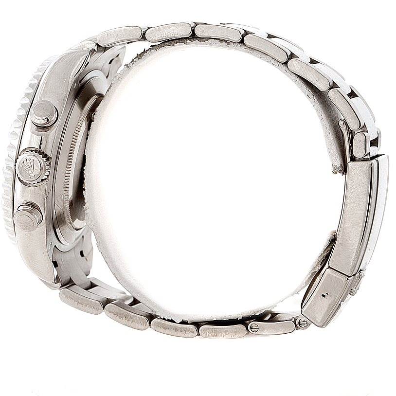 The image shows a side view of a Rolex Yacht-Master 116689 Men
s White Gold White Dial 116689 Men
s White Gold White Dial watch, highlighting the crown, case, and part of the bracelet.