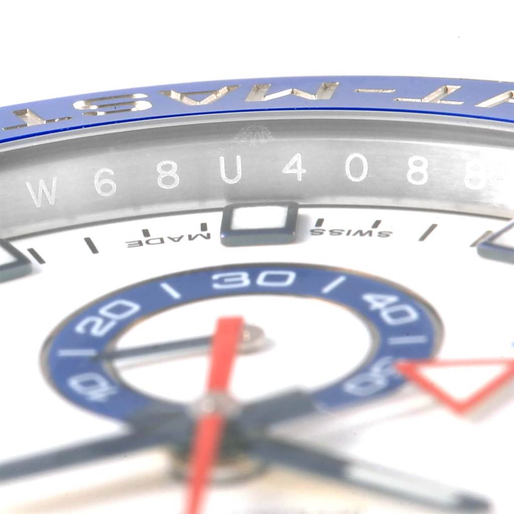 Close-up at an angle shows the serial number, bezel, and part of the dial of the Rolex Yacht-Master 116680 Men's Stainless Steel White Dial 116680 Men's Stainless Steel White Dial watch.