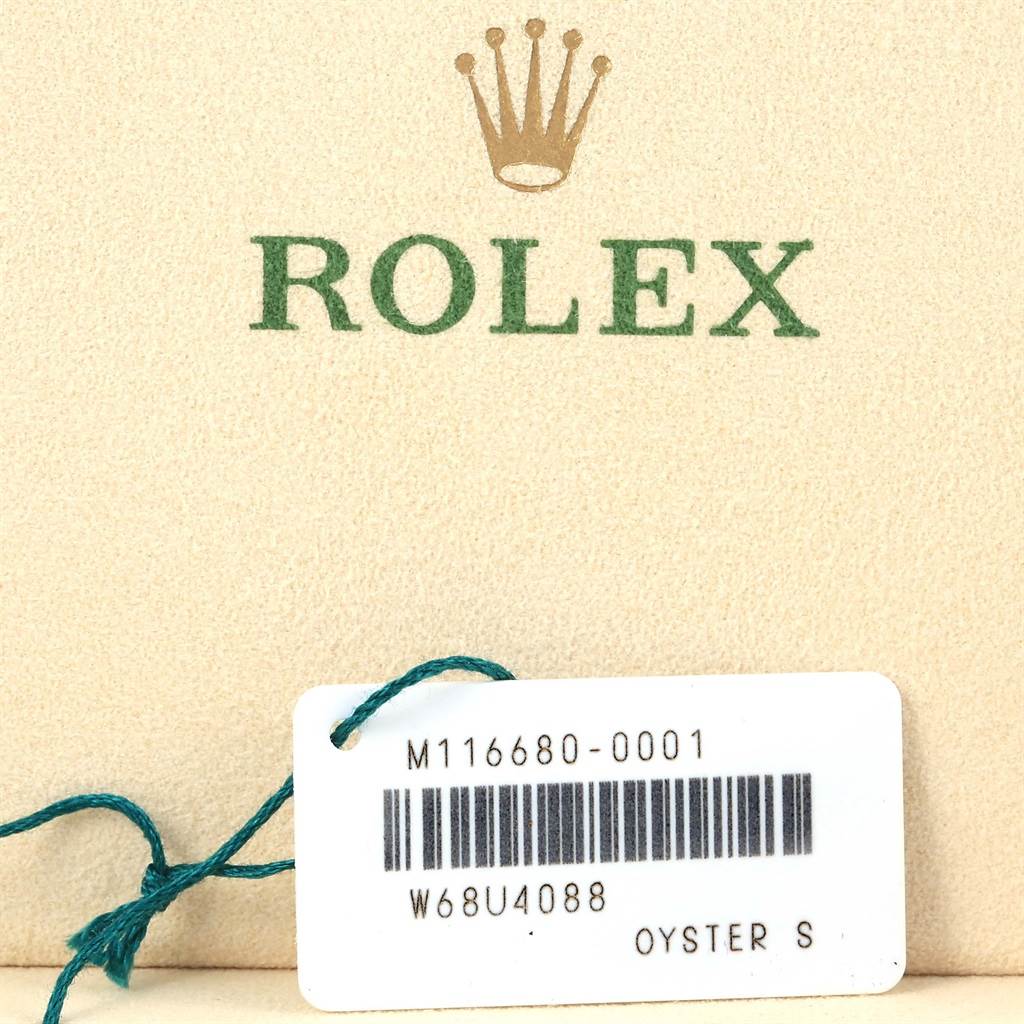The image shows a Rolex Yacht-Master 116680 Men's Stainless Steel White Dial 116680 Men's Stainless Steel White Dial tag with the model number and a green string, placed against a Rolex branded backdrop.