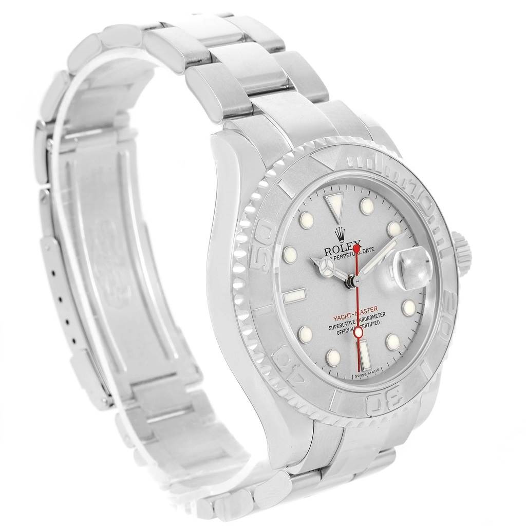 The Yacht-Master Rolex watch is shown in a three-quarter angle displaying the face, bezel, crown, and part of the bracelet.