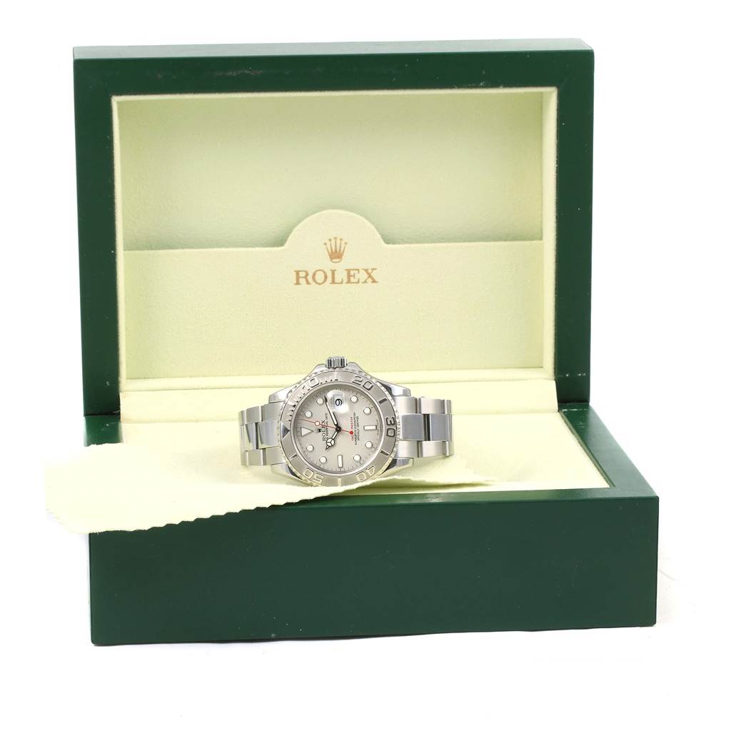 The Rolex Yacht-Master 16622 Men's Stainless Steel Silver Dial 16622 Men's Stainless Steel Silver Dial watch is displayed front-facing in an open green and beige box.
