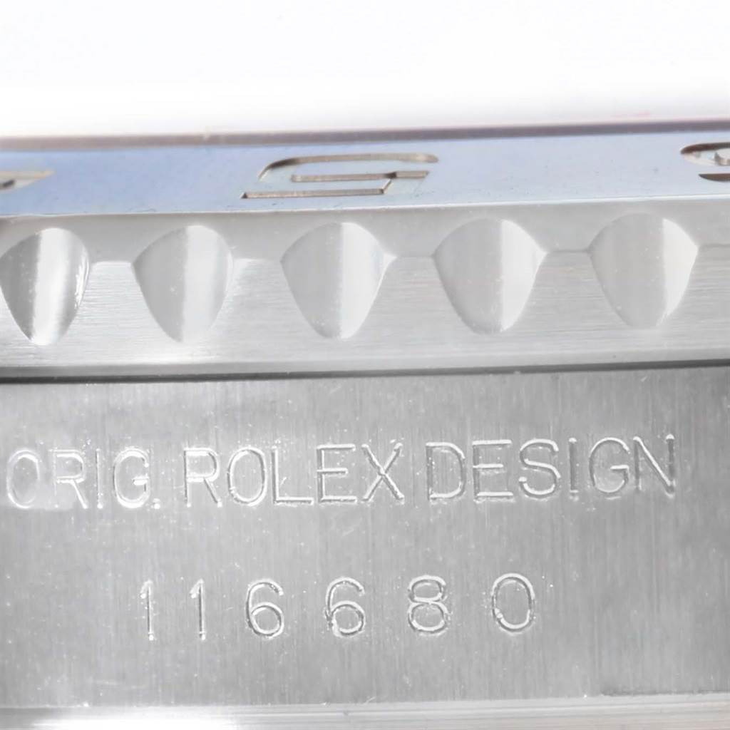 The image shows a close-up of the side engraving and bezel of a Yacht-Master model by Rolex.