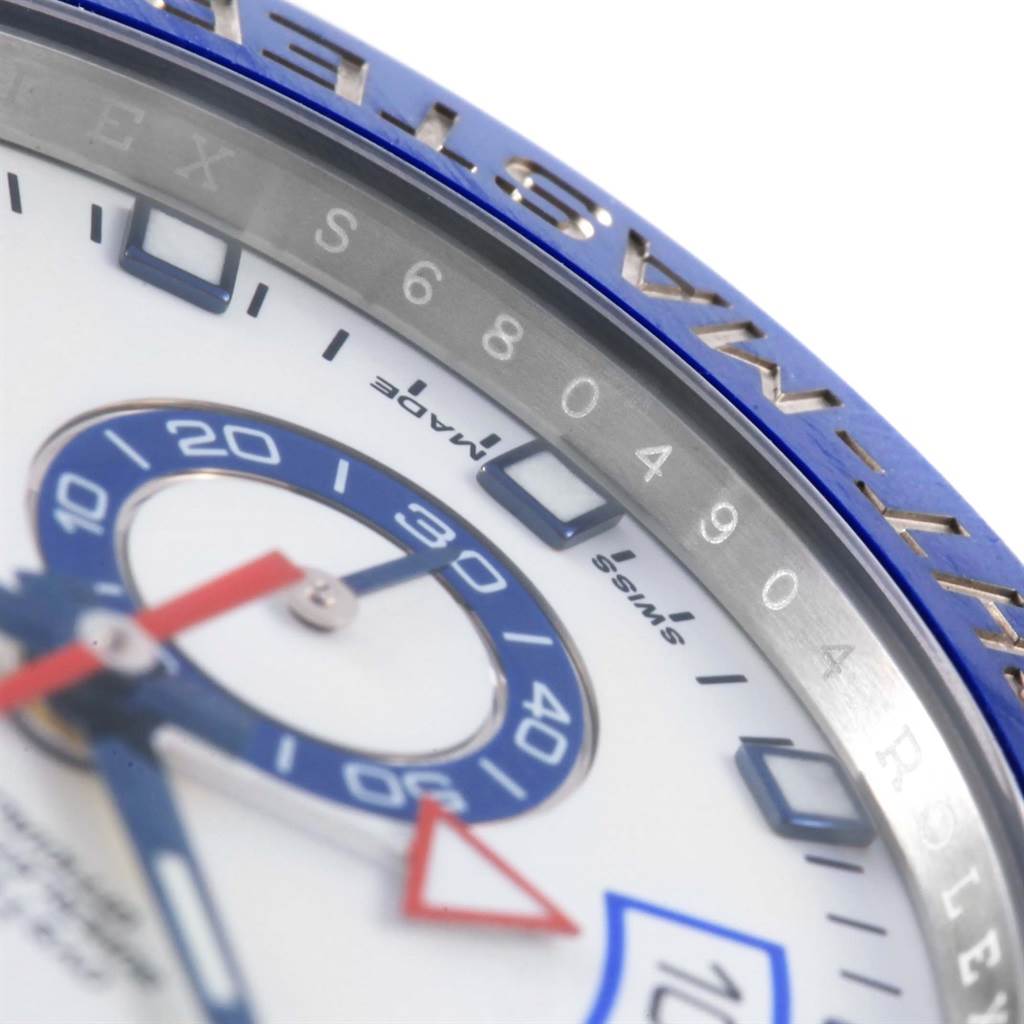 This close-up image shows part of the dial and bezel of a Rolex Yacht-Master 116680 Men's Stainless Steel White Dial 116680 Men's Stainless Steel White Dial watch, highlighting the numbers and markers.
