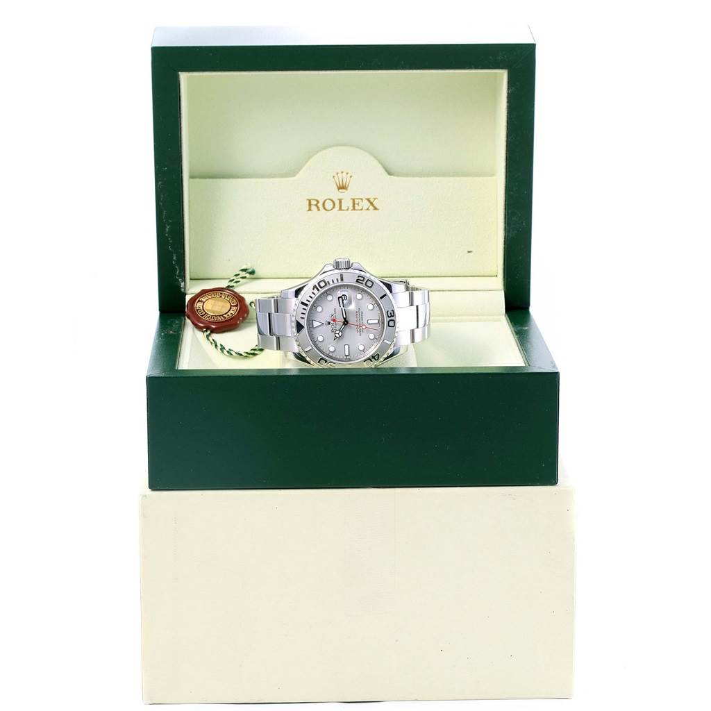 The Rolex Yacht-Master 16622 Men's Stainless Steel Silver Dial 16622 Men's Stainless Steel Silver Dial watch is displayed front-on, inside an open green and beige Rolex box.