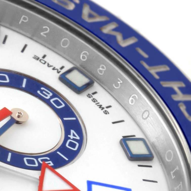 The close-up image shows the dial and bezel of the Rolex Yacht-Master 116680 Men's Stainless Steel White Dial 116680 Men's Stainless Steel White Dial watch with a blue accent and numbered hour markers.