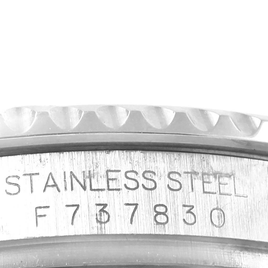 This image shows a close-up of the case and bezel edge of a Rolex Yacht-Master 16622 Men's Stainless Steel Silver Dial 16622 Men's Stainless Steel Silver Dial watch in stainless steel.