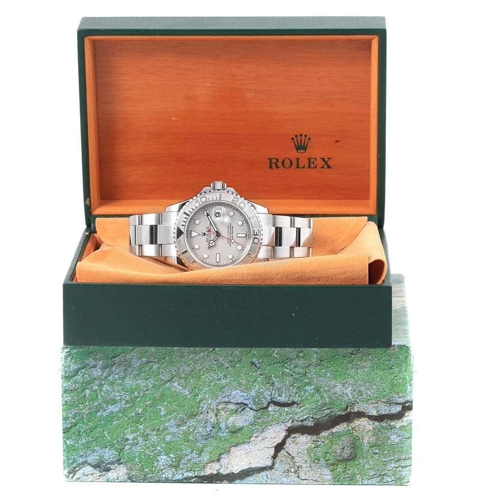 The Rolex Yacht-Master 16622 Men's Stainless Steel Silver Dial 16622 Men's Stainless Steel Silver Dial watch is shown from a front angle, displaying the face and bracelet inside an open Rolex box.