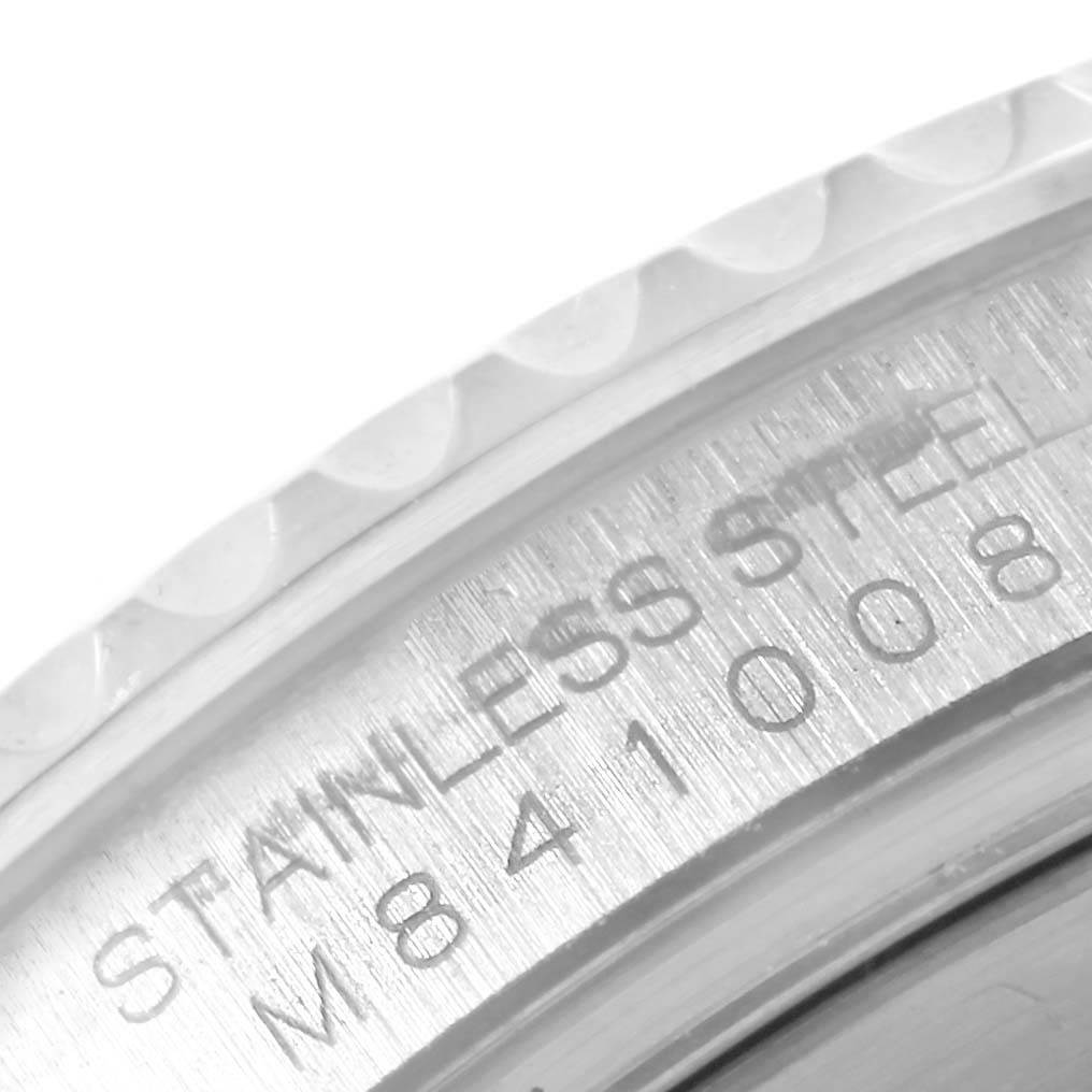 This close-up image shows the stainless steel bezel and model number engraving on a Rolex Yacht-Master 16622 Men's Stainless Steel Silver Dial 16622 Men's Stainless Steel Silver Dial watch.