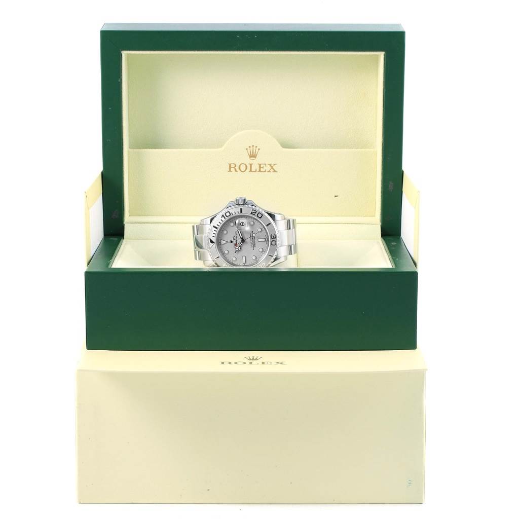 The Rolex Yacht-Master 16622 Men's Stainless Steel Silver Dial 16622 Men's Stainless Steel Silver Dial watch is displayed front-facing in its green and beige branded box.
