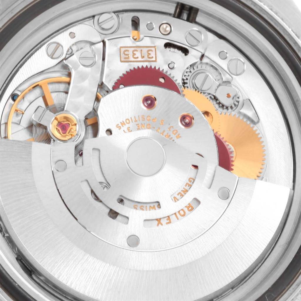 The image shows the internal mechanism of a Rolex Yacht-Master 16622 Men's Stainless Steel Silver Dial 16622 Men's Stainless Steel Silver Dial watch at a close-up angle, highlighting gears and movement parts.