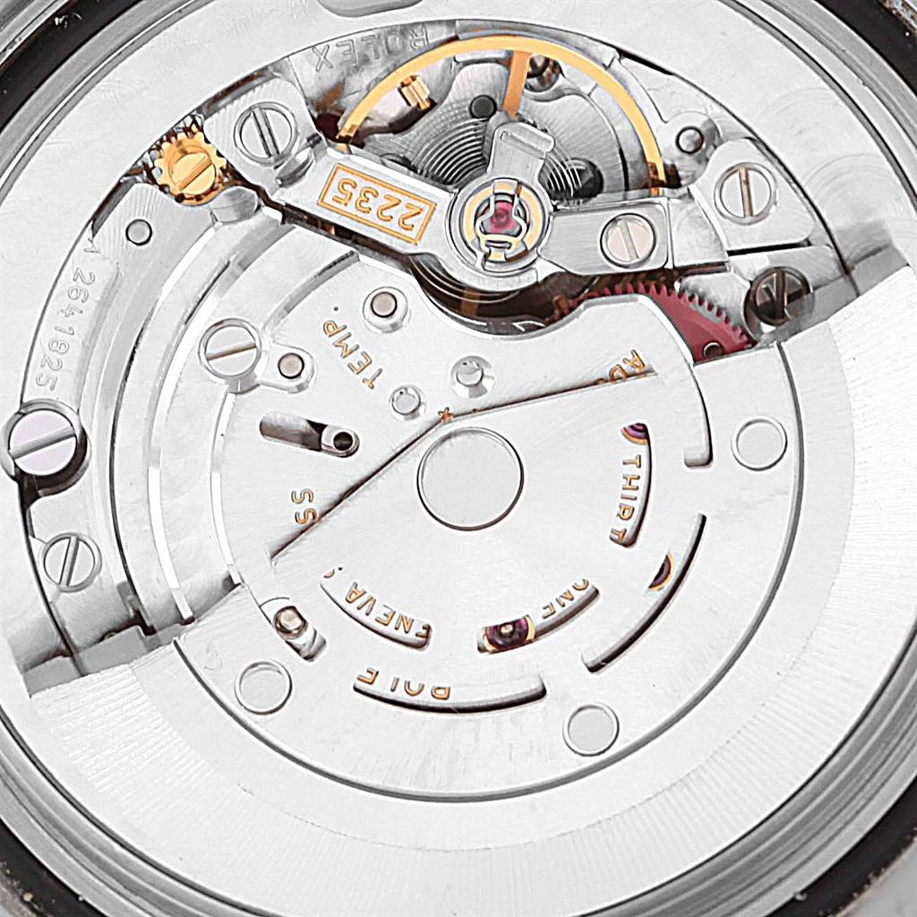 This is a close-up of the intricate internal mechanism of a Rolex Yacht-Master 168622 Men's Stainless Steel Silver Dial 168622 Men's Stainless Steel Silver Dial watch.