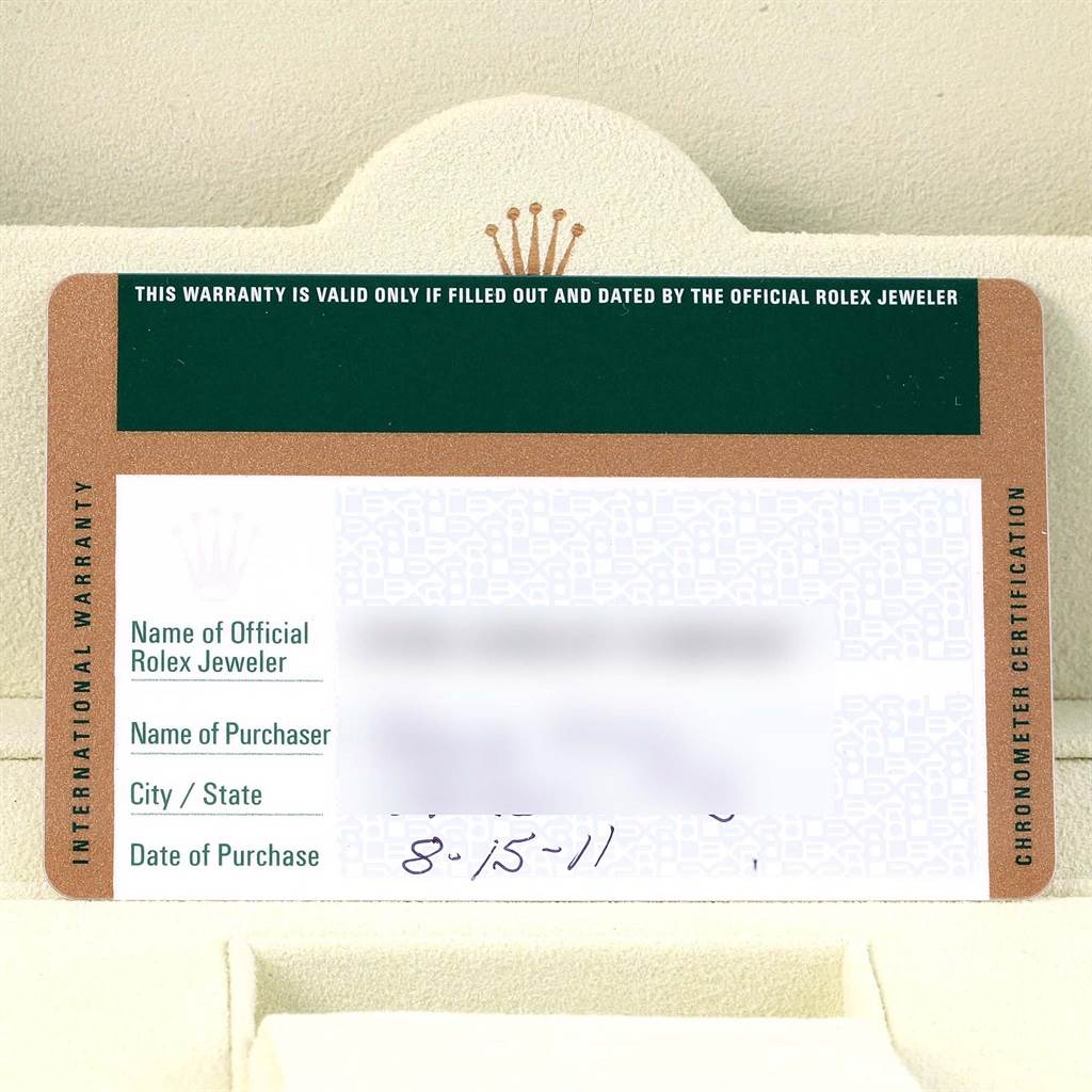 The image shows the international warranty card with chronometer certification for the Rolex Yacht-Master 168622 Men's Stainless Steel Silver Dial 168622 Men's Stainless Steel Silver Dial model.