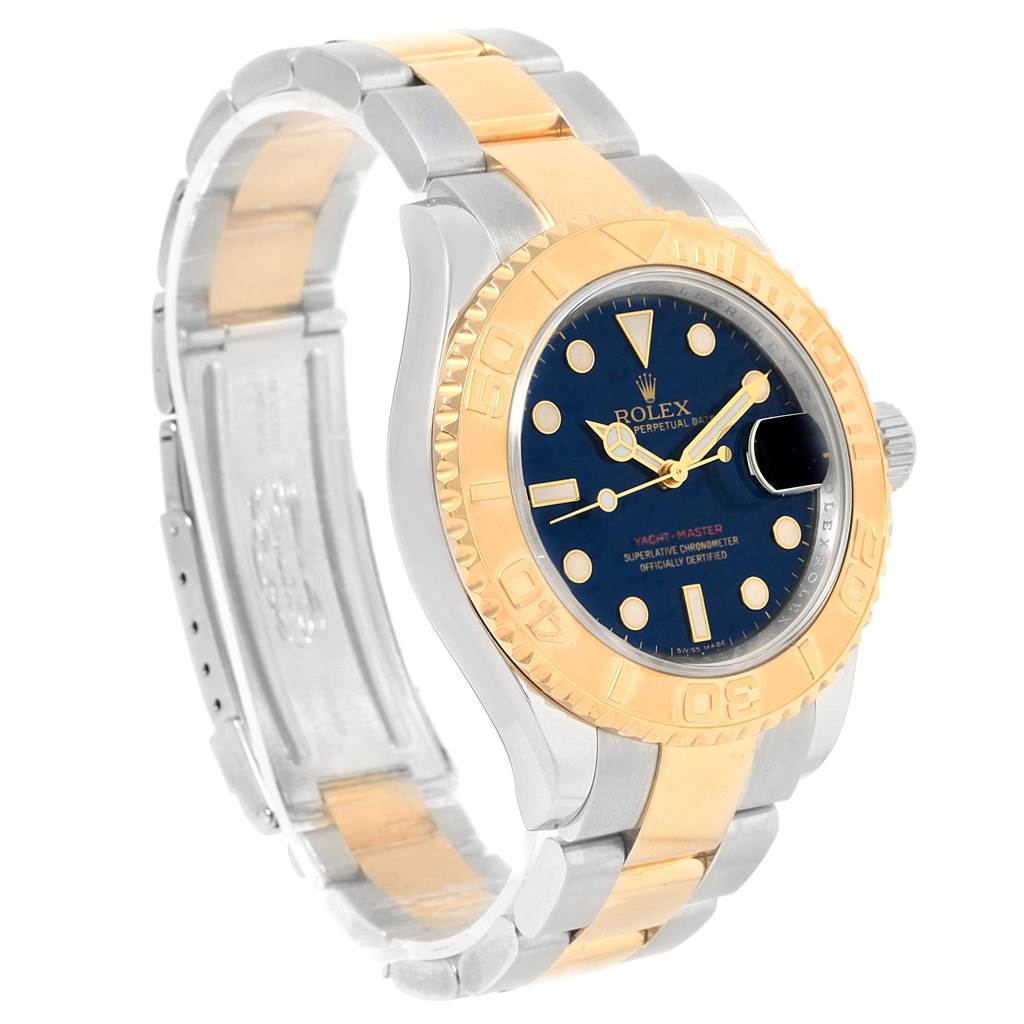 The image shows a Rolex Yacht-Master 16623 Men's Stainless Steel Blue Dial 16623 Men's Stainless Steel Blue Dial watch at a three-quarter angle, highlighting the two-tone bracelet, dial, and bezel.