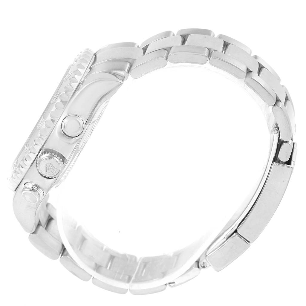 This side view image of the Rolex Yacht-Master 116689 Men's White Gold White Dial 116689 Men's White Gold White Dial watch shows the bracelet, crown, and pushers.