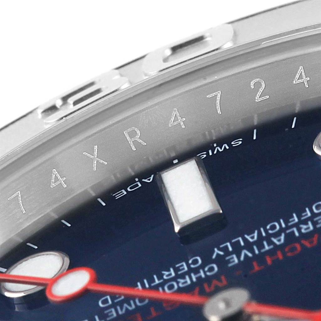 This close-up image of the Rolex Yacht-Master 116622 Men's Stainless Steel Blue Dial 116622 Men's Stainless Steel Blue Dial watch shows part of the dial, hands, markers, and partial bezel with reference engravings.