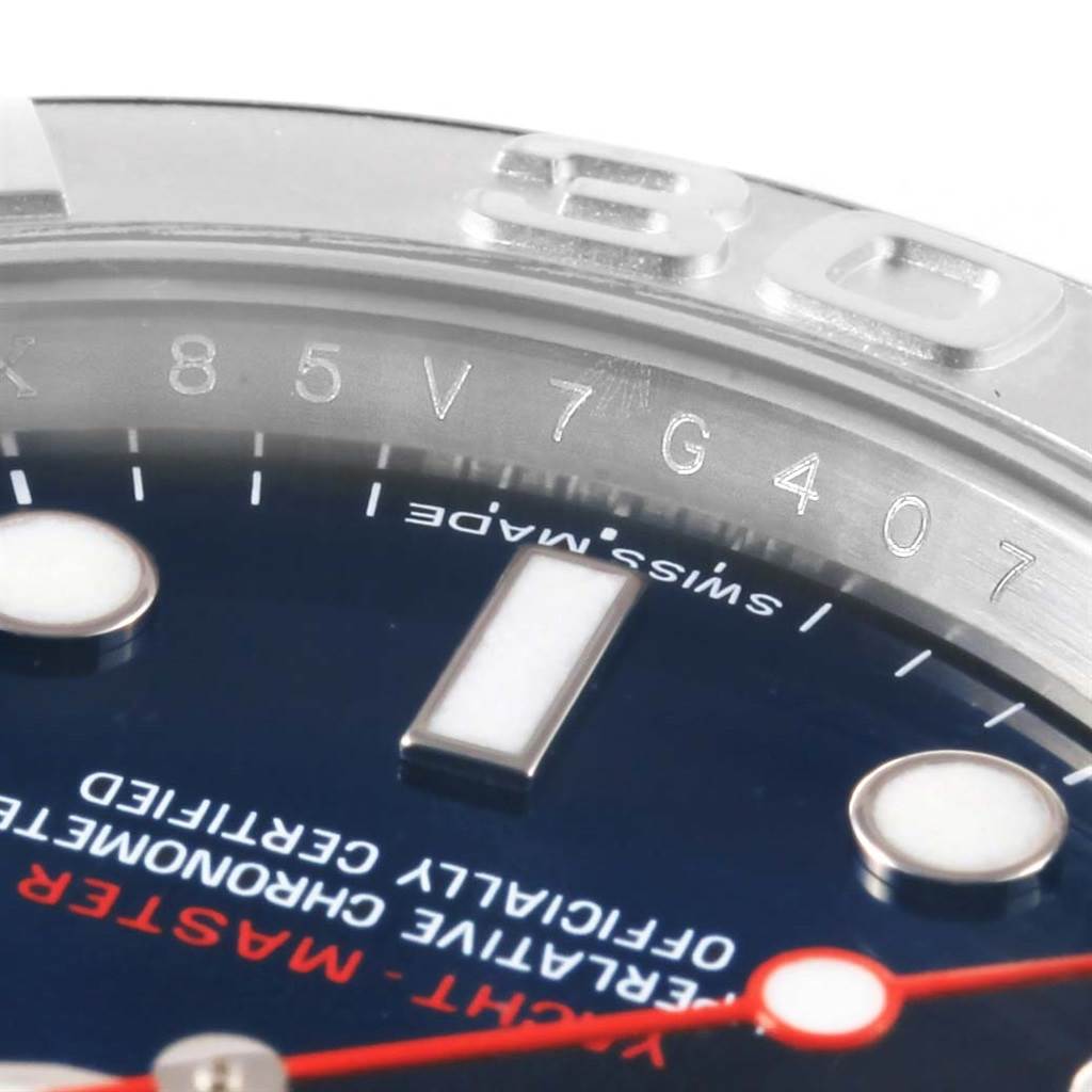 The image shows a close-up of the Rolex Yacht-Master 116622 Men's Stainless Steel Blue Dial 116622 Men's Stainless Steel Blue Dial watch face, bezel, and detailed engravings.